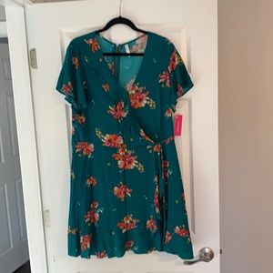 Brand new floral short sleeve wrap style dress
